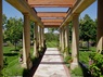 Landscape structure along walk creates formal entry to this Colorado home Structures & Stonework 9