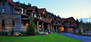 The mountain landscape design compliments the home's architecture
