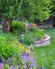 Depth, color, and texture are highlights of this English perennial garden in Colorado